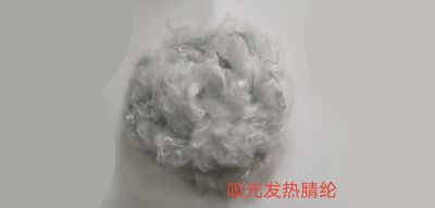 Light absorbing and heating acrylic fiber